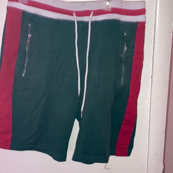 Green stretchy unisex shorts with red on both sides - Picture 1 of 3